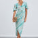 Flirty Flutter Sleeve Wrap Midi Dress in Mint Animal Print